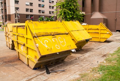 Front view of a commercial waste collection vehicle at a Mortlake site