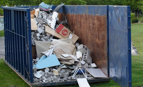 Inspector reviewing supplier documents during audit of waste removal contractor